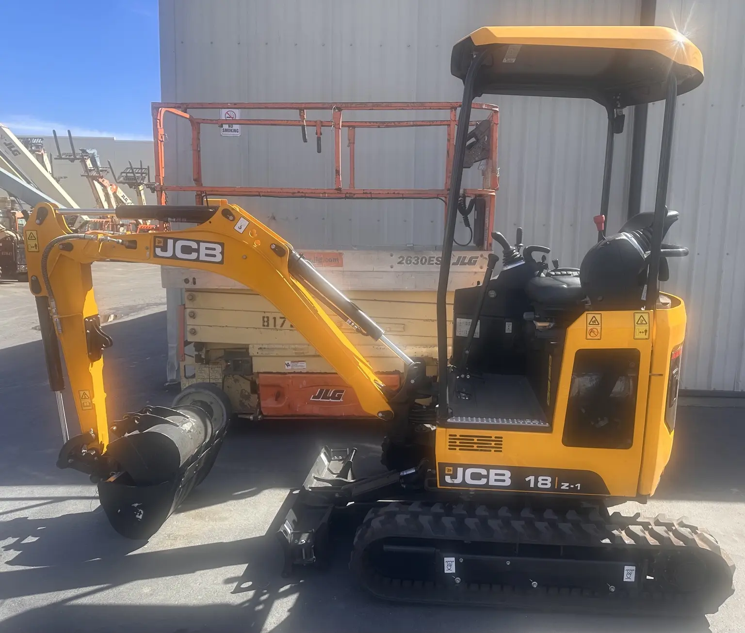 Compact mini excavator on a Southern California jobsite